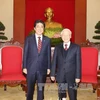 越共中央总书记阮富仲会见日本首相安培晋三（图片来源：越通社）