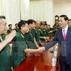 陈大光主席与第九军区领导握手