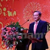 越南驻老大使阮伯雄在招待会上发表讲话