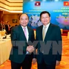 阮春福总理和通伦•西苏里总理共同出席越老政府间联合委员会第39次会议
