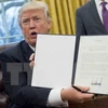 美国总统特朗普签署退出TPP行政令