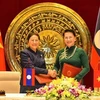 越南国会主席与老挝国会主席签署合作协议。（图片来源：国会网站） 