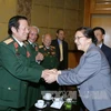 老挝国会主席巴妮·雅陶都会见越老友好协会代表（图片来源：越通社）