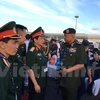 越南人民军总参谋长、国防部副部长潘文江中将（中间）