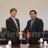 越南计划与投资部部长阮志勇（右）与日本国际协力机构（JICA）主席北冈伸一