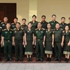 越南中央军委-国防部办公厅副主任阮春议少将与培训班学员合影留念。