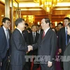 越南国家主席陈大光（右）和中国国务院副总理汪洋（左）。