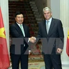 越南政府副总理兼外交部长范平明与西班牙外交与合作大臣达斯蒂斯。