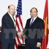 越南政府总理阮春福与美国商务部部长罗斯。
