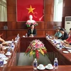 越南芹苴市人民委员会副主席张光淮南与日本国际协力机构代表举行工作会议。（图片来源：越通社）