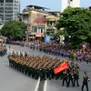参展作品之一：越南人民军队战士参加游行活动庆祝九•二国庆节70周年。（维灵 摄）