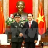 越南国家主席陈大光​（右）与中共中央军委副主席范长龙​ （左）。