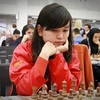 越南棋手阮氏梅兴在比赛中（图片来源：体育报）