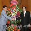 新任越南祖国阵线中央委员会主席陈青敏会见柬埔寨祖国发展团结阵线理事会代秘书长南•瓦丽。