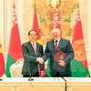越南国家主席陈大光和白俄罗斯总统亚历山大·格里戈里耶维奇·卢卡申科。（图片来源：越通社）