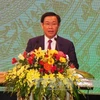 越南政府副总理、委员会主任王廷惠在会议上发表讲话。（图片来源：越通社）