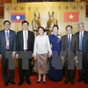 老挝国会主席巴妮•雅陶都和越南国会主席阮氏金银及各位代表。