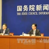 广西壮族自治区副主席张晓钦（右）在新闻发布会上发表讲话。（图片来源：越通社）