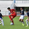 越南U15队（红衣）逆转取得对手（图：体育报）