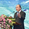 政府总理阮春福在山罗省投资促进会上发表讲话。（图片来源：越通社）