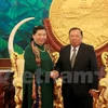 越南国会副主席丛氏放（左）和老挝国家主席本扬·沃拉吉。