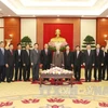 越共中央总书记会见老挝人民革命党代表团