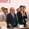阮春福总理出席越南私营经济论坛。