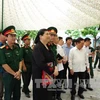丛氏放参观老挝人民党第二次全国代表大会预备会历史遗址。