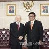 阮富仲总书记会见印尼地方代表理事会主席乌斯曼·沙普达。（图片来源：越通社）