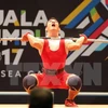 越南举重运动员石金俊。（图片来源：越通社）