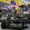 资料图：马来西亚军队建军60周年阅兵式。
