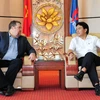 越南油气集团总裁阮雄勇会见美国爱依斯电力公司负责越南市场总经理大卫·斯通。