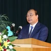 越南政府总理阮春福在国防学院2017-2018学年开学典礼发表讲话。（图片来源：越通社）