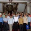 胡志明市人民委员会常务副主席黎清廉与老挝川圹省和公安部代表团。（图片来源：voh.com.vn）