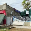 第十号台风导致许多房屋倒塌。（图片来源：越通社）
