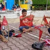 附图：儿童们亲手制作越南传统五角星灯。（图片来源：互联网）