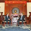胡志明市市委书记阮善仁在会见法国开发署新任驻越南首席代表法布里奇·里奇（图片来源：越通社）