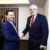 越南财政部长丁进勇与澳大利亚财政部长斯科特•莫里森​ 。