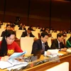 越南第十四届国会第四次会议的代表（图片来源：越通社）