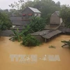 老挝国家主席本扬·沃拉吉致电慰问越南受灾群众