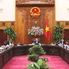越南政府总理阮春福指导该礼BOT收费站暂时停止收费