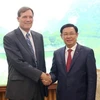 政府副总理王廷惠会见USAID驻越首席代表迈克尔·格林。（图片来源：越通社）