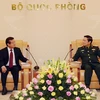 越南国防部部长吴春历大将会见柬埔寨内政部国务秘书腾沙旺