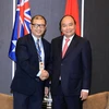 政府总理阮春福会见在澳越南企业家和科学家代表