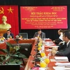 越南与老挝分享政治系统运行经验