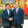 越南国家主席陈大光会见老挝总理通伦·西苏里