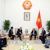 越南政府总理阮春福会见德国驻越大使贝格尔