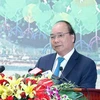 政府总理阮春福：在不久的将来朔庄省将成为各家投资商的“银库”