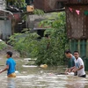 多国受暴雨台风袭击 中国多地交通阻断 菲律宾5人死亡