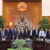 越南政府总理阮春福会见有意对薄辽省投资的客商